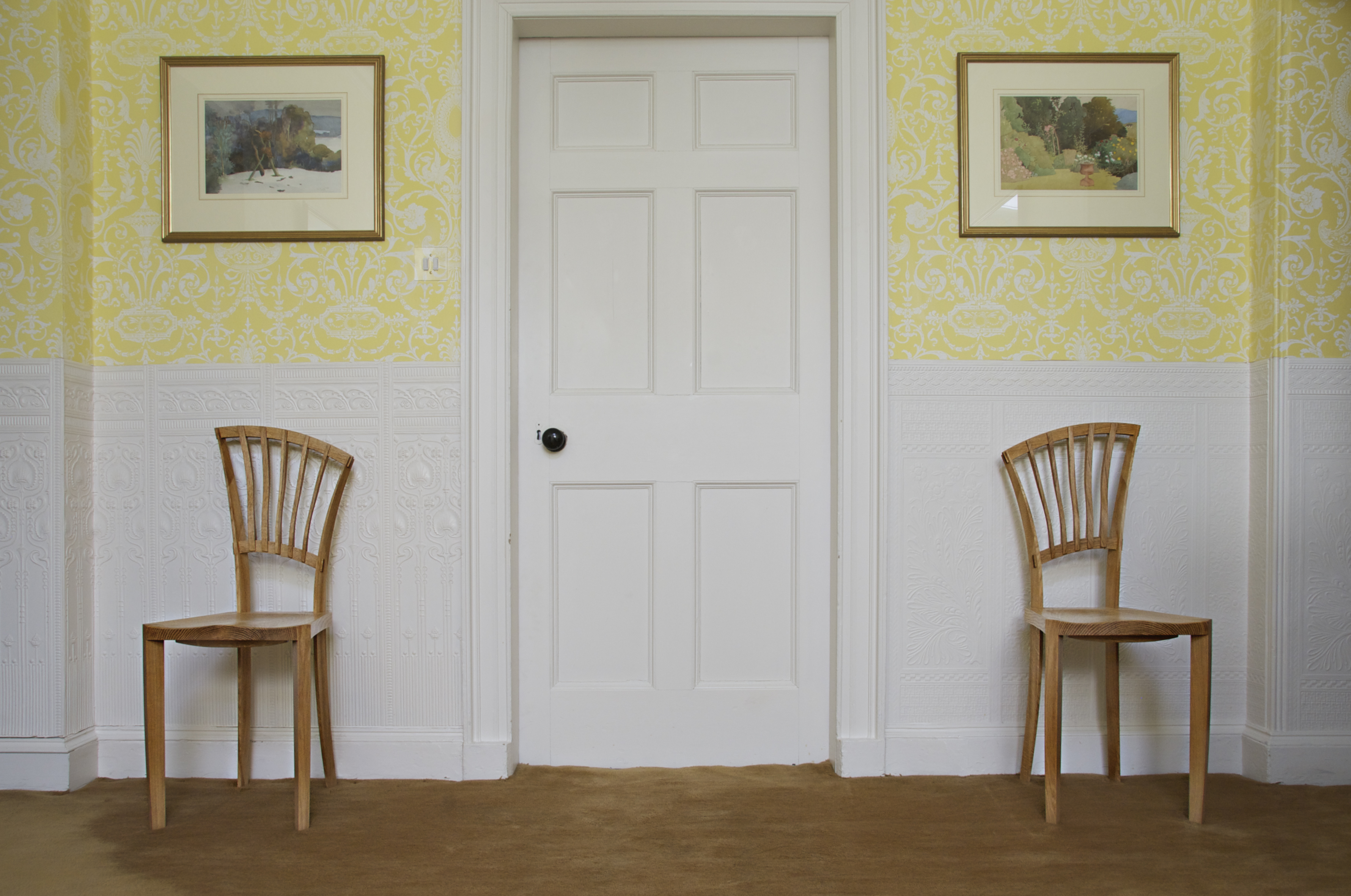 Mirror-matched occasional chairs in oak